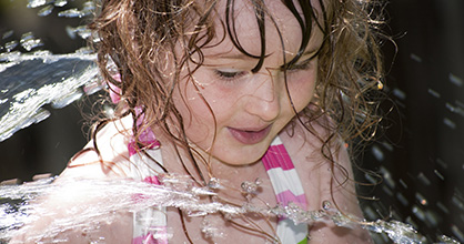 Happy little girl at a water park.